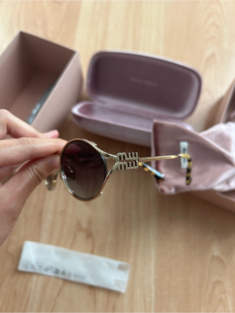 Authentic Miu Miu 52YS Oval sunglasses with pale gold frame & grey gradient lens - Picture 2 of 7